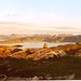 Mitternachtssonne über den Inseln und Meeresarmen oberhalb Hammerfest