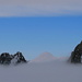 Just before diving into the fog again. <br />Schafwisspitz in the center and Zehenspitz on the right