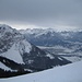 Tiefblick auf das verschneite Oberstdorf - links Rubihorn, rechts Hoher Ifen und in der Mitte der Fellhorngrat