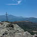 Der Gipfel, im Hintergrund Saint'Antonino und der korsische Hauptkamm mit dem Monte Grosso