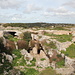 Għar il-Kbir - Die ehemaligen Wohnhöhlen befinden sich südlich von Buskett mit dem Verdala-Palast (im Hintergrund). In der Umgebung liegen zahlreiche ehemalige und heute noch genutzte Steinbrüche. Auch unzählige der legendären "Karrenspuren" (cart ruts) sowie punische Grabstätten befinden sich in der Nähe.