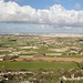 Salib tal-Għolja / Laferla Cross - Ausblick vom Laferla-Kreuz # 1. In etwa nordöstlicher Richtung ist das dicht besiedelte Gebiet um Maltas Hauptstadt Valletta zu sehen. Auch das Mittelmeer ist im leichten Dunst als schmaler Streifen zu erahnen. Foto vom 04.02.2013.