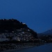 The warm lights of Berat, from the brdige over the Osumi river, with icy Tomorri in the distance