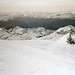 Verschneite Glarner Alpen über dem Vorderrheintal. Am Horizont die Adula. Rechts im Bild die Gletscher um den Piz Medel.