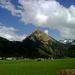 Blick zurück aus dem Talgrund bei Schoppernau zum stolzen Gipfel der Üntschenspitze samt Westgrat.<br /><br />Im Wald ist's noch rutschig, [u alpstein]