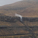 Bei Eiði - Ausblick etwas südlich des Ortes bei äußerst misserablem Wetter über den Sundini nach Streymoy. Extreme Sturmböen treiben das Wasser eines Wasserfalls immer wieder nach oben ... (Foto vom 29.04.2013).