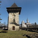 Turnul Manastirii Humorului si in plan indepartat biserica comunei