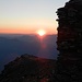 Sonnenaufgang mit Gipfelsteinmann