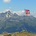 Bandiere grigionese e svizzera e Piz Ot