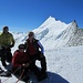 Am Gipfel mit Weisshorn und dessen Nordgrat<br />mein Bruder Wolfgang, meine Frau Greti und ich (v.l.)