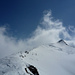 Aufstieg gegen das Stockhorn vor heraufziehenden Wolkenfetzen