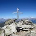 Gipfelkreuz Pic d`Artsinol (2998 m)<br />Im Hintergrund die Berner Alpen