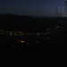 le luci dei paesini che fanno da corona al lago di Como: in fondo a destra e in alto,Pigra,sotto Argegno