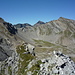 Im Abstieg über den Alta Burasca W-Grat: links Cima de la Bedoleta, rechts Piz Pian Grand über Pian Grand. Darüber Filo di Revi und Cima dei Cogn