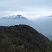 Nelle nubi i monti della Valcuvia; in primo piano la cresta dove il Sentiero perduto si svolge
