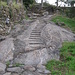 Un tratto della mulattiera che sale a Praja, i gradini sono stati scalpellati nella roccia nel 1879.
