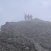 Nebel wallen um den Gipfel des Exnerturmes - und verhüllen die allseits abfallenden Wandfluchten.