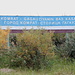 Komrat - Das Ortseingangsschild von "Komrat - Hauptstadt Gagausiens" ist auf Gagausisch und Russisch beschrift. In der Stadt selbst gibt es teilweise sogar dreisprachige Beschriftungen (außerdem Moldauisch).