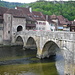 Doubs-Brücke mit Stadttor von St-Ursanne