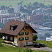 Quite a contrast: the old house at Schindellegi and the modern buildings down in Zug as seen from Hochwacht