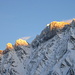 Die Spitzen von Gross Schiben und Piz Sardona leuchten im goldenen Licht der untergehenden Sonne