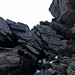 eine der Kletterstellen in schwarzem Fels
