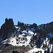 Some of the towers of Thunder Mountain<br />On the right (annotated) the highest point (9410 ft), which is the Amador County Highpoint. <br />The Thunder Mountain which is marked on all of the maps is further west and actually two feet lower (9408 ft) than the East peak.<br />The distinct towers on the left hand side are called <i>The Glove</i> or <i>Glove Rock</i>