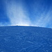 Der letzte Gipfelhang - oben blästs Schnee wie aus einer Schneekanone