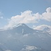 Das Kröndlhorn ist von "Sommer"wolken umkränzt, während im Hintergrund Gabler und Reichenspitze als typisches Doppelhorn herübergucken.
