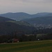 Aussicht bei Junkelts unterhalb Arboldswil hinunter nach Bubendorf (369m). Im Hintergrund ist der Hügel Alti Stell (614m) zu sehen auf dem sich der Liestaler Aussichtsturm befindet.