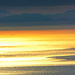 la Corsica e un mare d'oro visti dalla vetta del Pizzo d'Uccello (Foto M:B.)