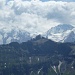 im Vordergrund die Lobhörner, rechts die Jungfrau mit Silberhorn, Mitte Jungfraujoch, links in den Wolken der Eiger.