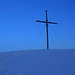 Genau zum Sonnenaufgang erreichte ich nach Plan das wuchtige Gipfelkreuz auf dem 3066m hohen Piz Starlex Südgipfel.