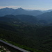 dal monte Palanzone: le Grigne,i Corni di Canzo a destra e dietro di essi il monte Resegone (riconoscibile per la sua cresta seghettata)