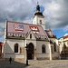 Nach der Rückreise von Split nach Zagreb hatte ich in der kroatischen Hauptstadt noch viel Zeit am Nachmittag um einen ausgiebigen Spaziergang zu unternehmen. Bei der Anreise schaute ich mir die Unterstadt an, nun hatte ich Zeit für durch die Oberstadt zu spazieren.<br /><br />Auf dem Foto ist die Crkva svetoga Marka, auf Deutsch Markuskirche.Auf dem Platz vor der Kirche finden seit 1256 regelmässig Märkte statt. Die Kirche selbst ist ziemlich alt, der Glockenturm jedoch etwas jünger aus dem Jahr 1725. Das Dach wurde Ende des 19.Jahrhunderts gestalten.