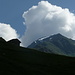 Aufstieg nach Rämi: harmlose Quellwolken über den obersten Alphütten und dem Schilthorn