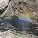 schöner Regenbogen in einem Wasserfallschleier kurz vor Unterschächen