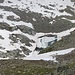 <b>Laghetto a quota 2395 m sul versante ovest della Valle dei Cani.<br />“La neve lo spinge e la roccia lo trattiene” (Patrizio Tosetti).</b>