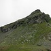 Über den Durchschlupf links erreiche ich das Gipfelplateau des Hanenstocks. Die direkte Überwindung des schmierigen Felsbandes war heute nicht angezeigt.