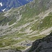  il Vallone di Oriaccia e l'omonimo lago,in alto sulla sinistra della foto si nota il sentiero che proviene  dall' alpe il laghetto
