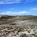 Il vallone sottostante il monte Amaro. Si vede un buco in primo piano.