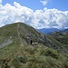 risalendo sulla cima che fronteggia la Cima di Lemma