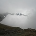 Grat beim Passo del Camerozzo verschwindet im Nebel