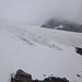 Erster Blick zur Lagaunspitze (mit Gipfel im Nebel). Rechts unten ist die Gletscherzunge gerade nicht mehr zu sehen.
