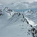 Die letzten Meter vor dem Gipfel, links der Piz Clüx und daneben Piz Languard (im Hintergrund), rechts der Piz Albris