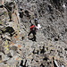 Climbing the crux on the south side to the highpoint (East Peak)