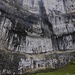 Malham Cove. Notice the group of climbers below the marker for a sense of scale.