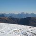 über dem Passo San Lucio treten in der Ferne die Grigne in Erscheinung  