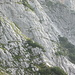 Im Zoom erkennt man Bergsteiger in den Einstiegslängen des Leoganger Süd