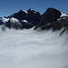 Der Nebel wabert die Darran Mountains hoch